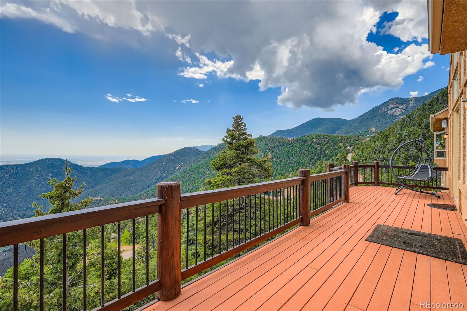 570 Upper Vista Road Manitou Springs, CO 80829 - Photo 35 of 36 a view of a balcony with wooden floor