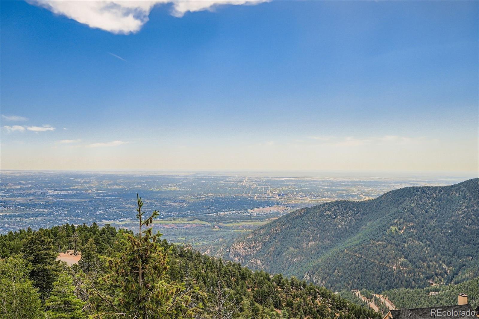 570 Upper Vista Road Manitou Springs, CO 80829 - Photo 36 of 36 a view of an ocean beach and mountain