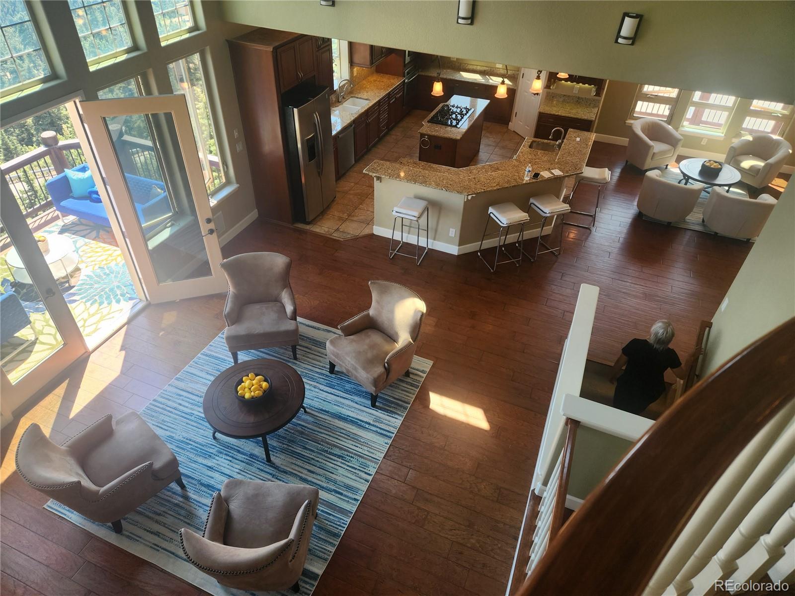 570 Upper Vista Road Manitou Springs, CO 80829 - Photo 7 of 36 a living room with furniture and wooden floor