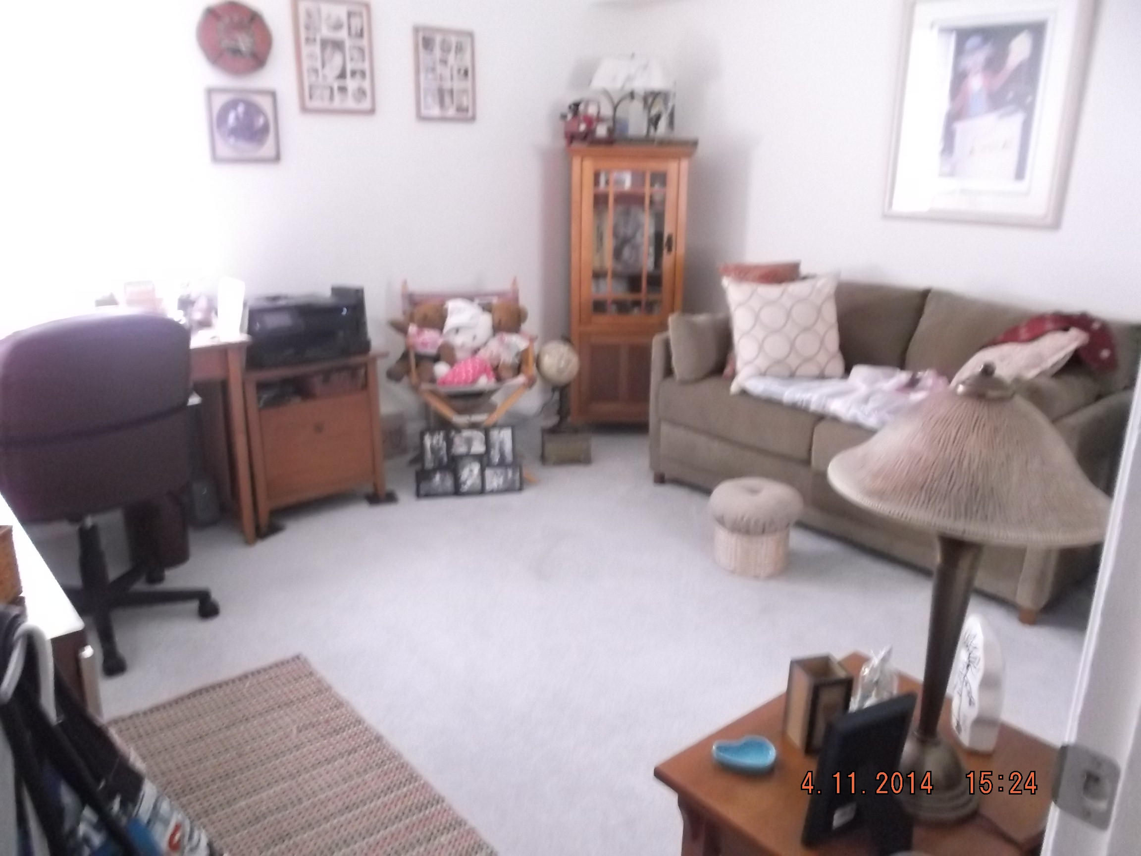 6133 Balboa Circle, Unit 405 Boca Raton, FL 33433 - Photo 22 of 36 a living room with furniture and a couch