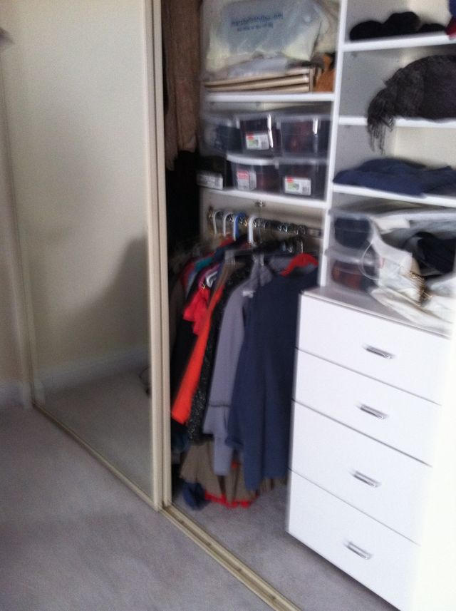 6133 Balboa Circle, Unit 405 Boca Raton, FL 33433 - Photo 25 of 36 a view of walk in closet with clothes and shoes