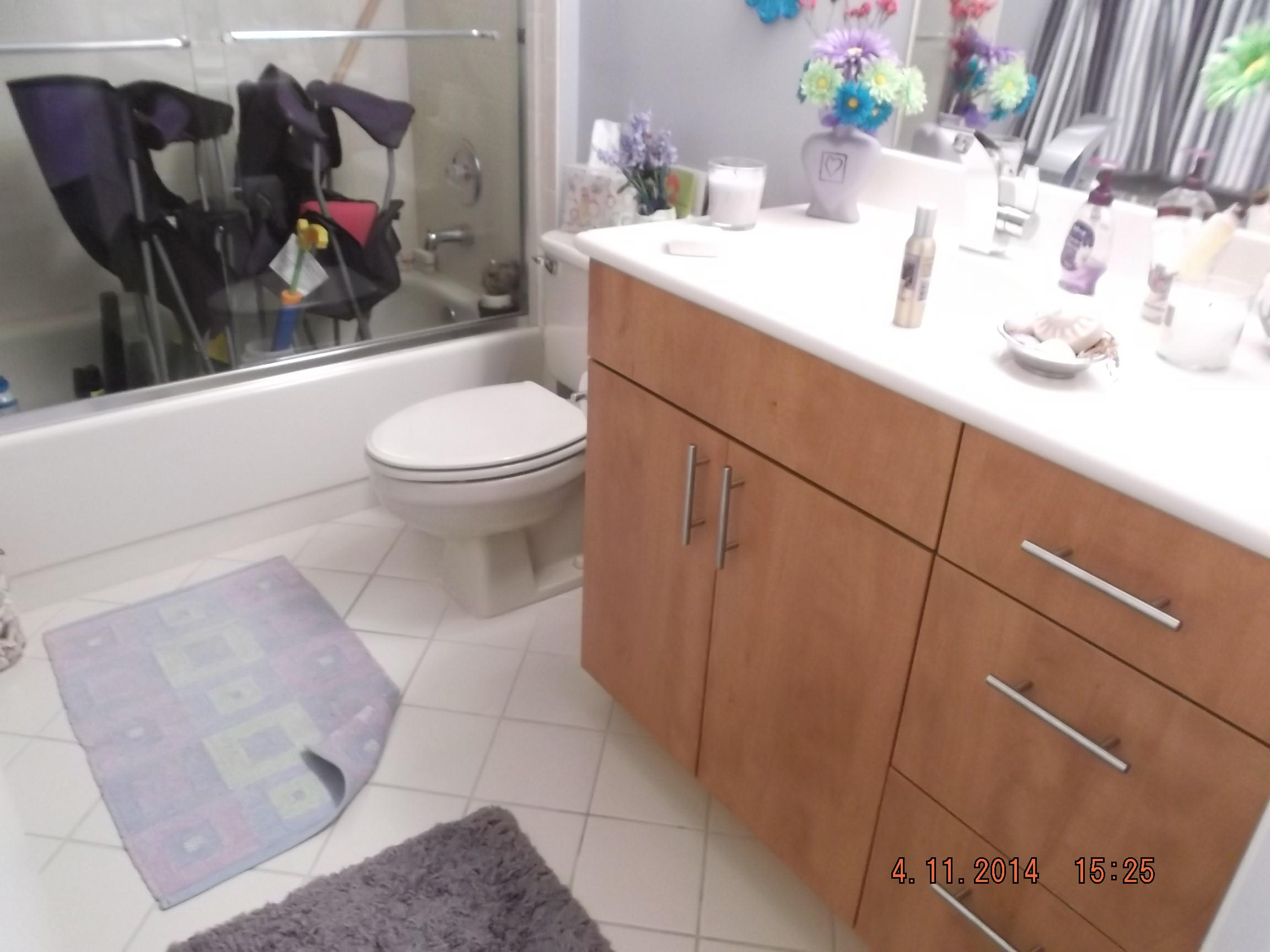 6133 Balboa Circle, Unit 405 Boca Raton, FL 33433 - Photo 26 of 36 a bathroom with a sink and a toilet