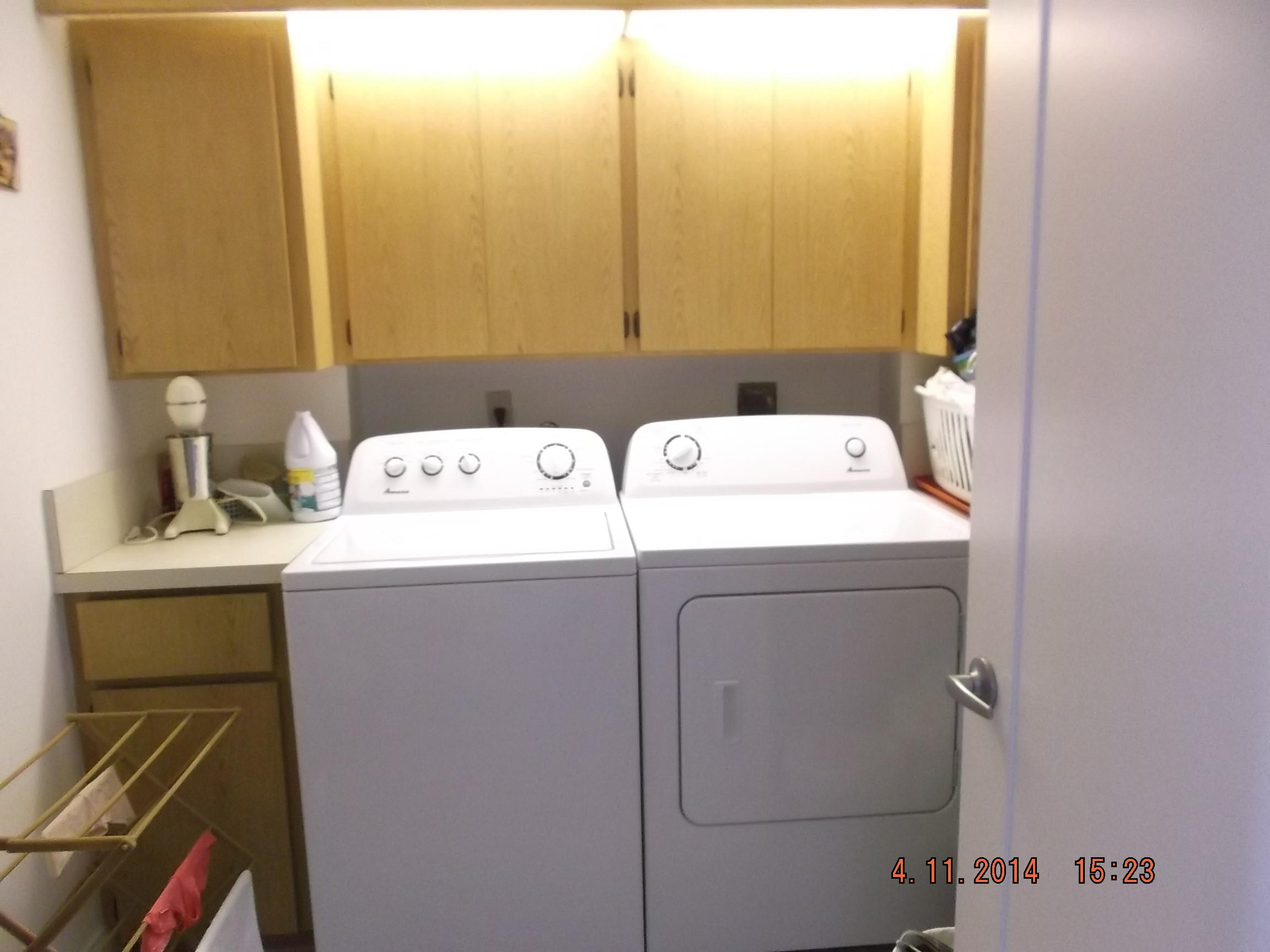 6133 Balboa Circle, Unit 405 Boca Raton, FL 33433 - Photo 27 of 36 a utility room with dryer and washer