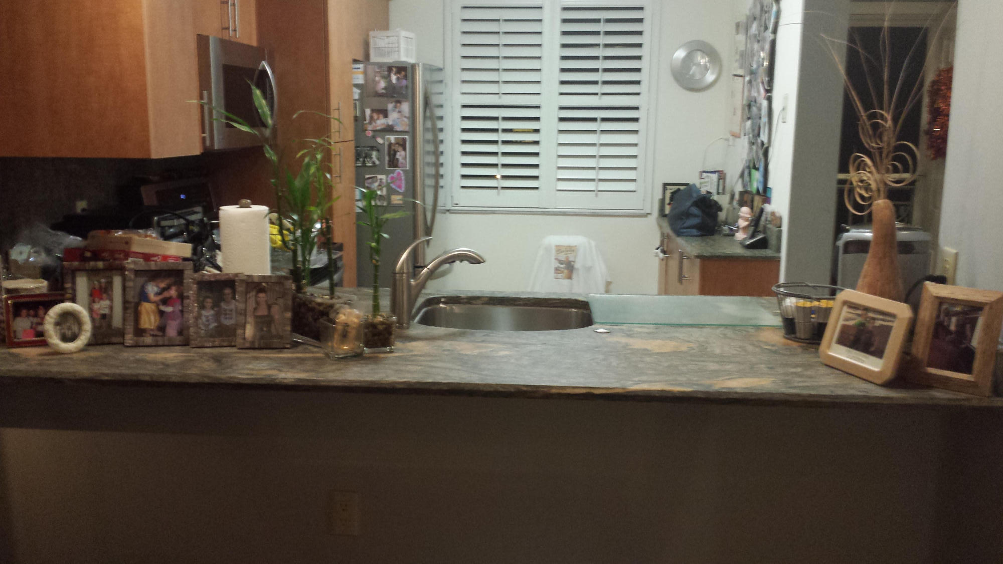 6133 Balboa Circle, Unit 405 Boca Raton, FL 33433 - Photo 7 of 36 a bathroom with a sink and a mirror