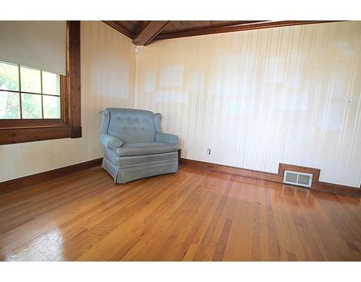 33 Holy Cross Street Springfield, MA 01104 - Photo 8 of 34 a view of livingroom with furniture and wooden floor