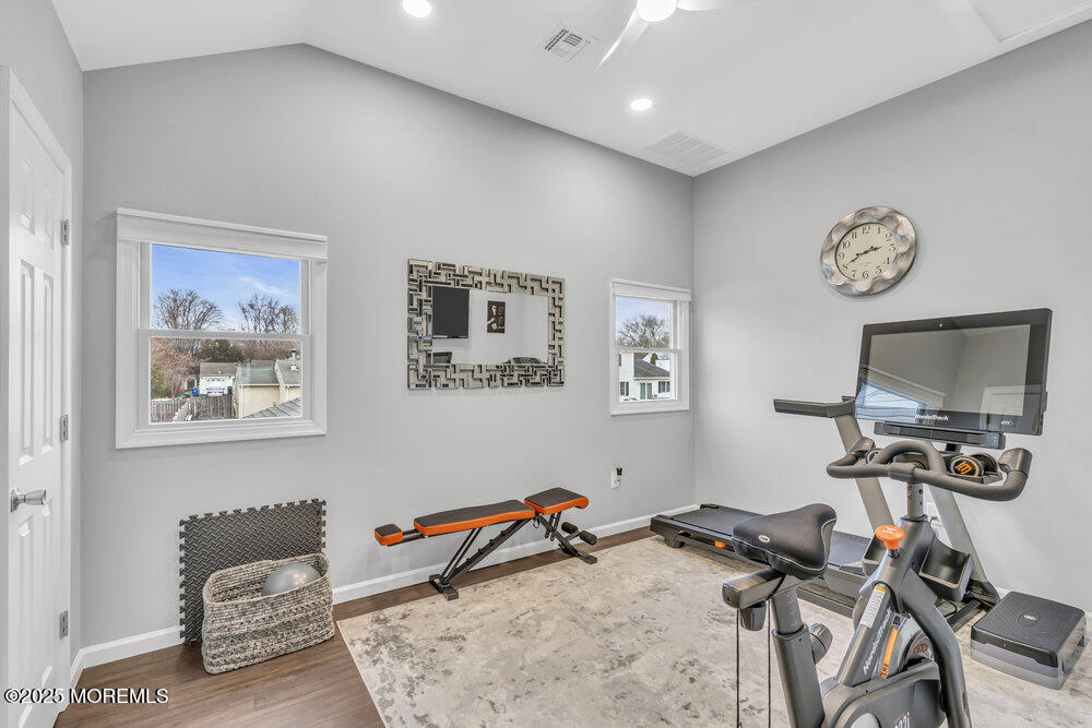 14 Starlight Road Howell, NJ 07731 - Photo 27 of 71 a room with furniture and air hockey table
