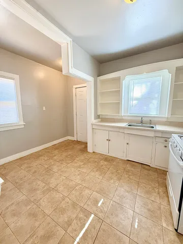 a view of a kitchen with a sink