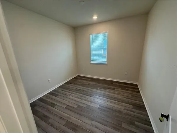 a bathroom with a double vanity sink toilet and shower