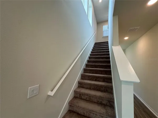 an empty room with an entryway
