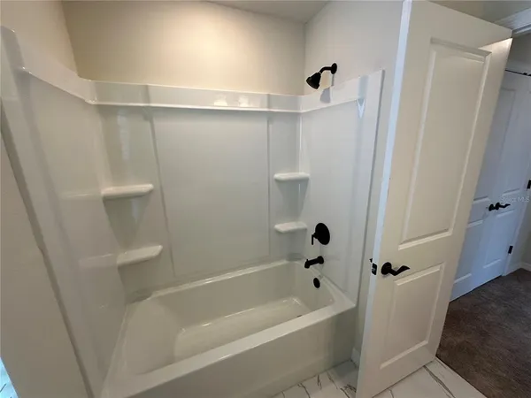 an empty room with an entryway