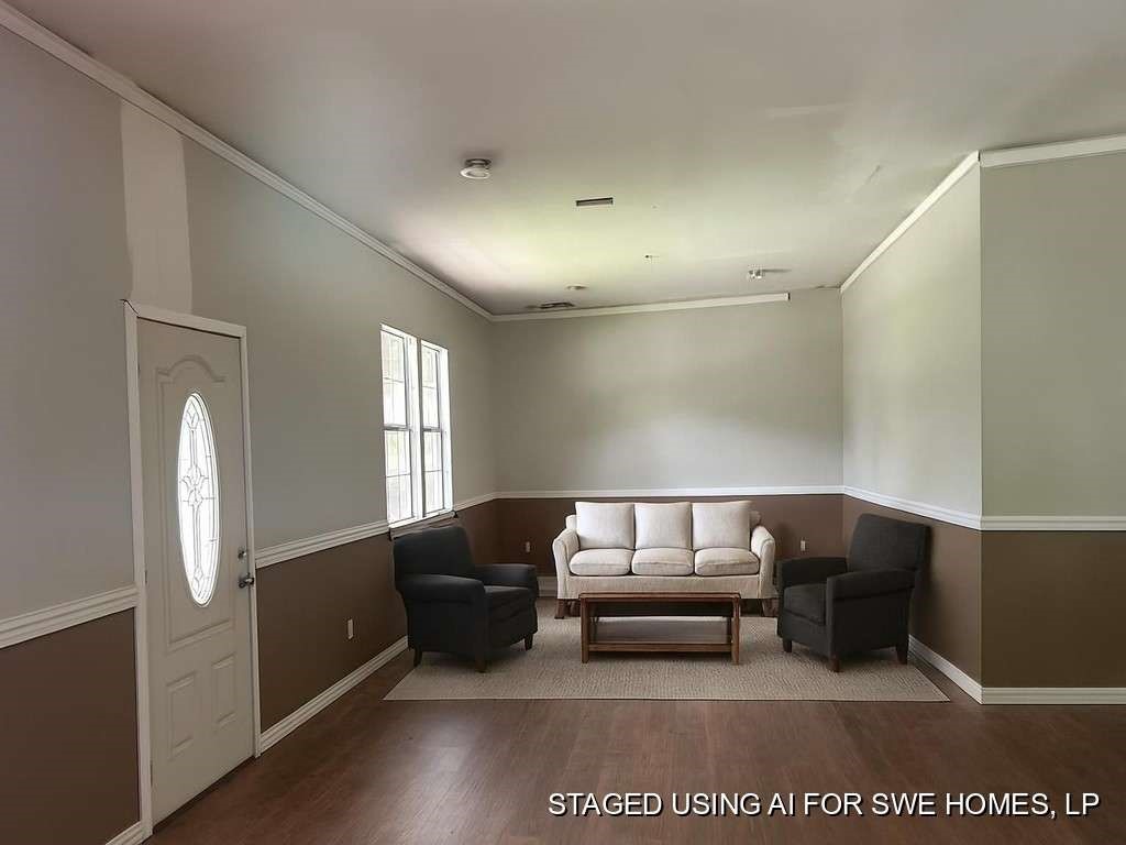 206 Grayson Street Teague, TX 75860 - Photo 4 of 9 a living room with furniture