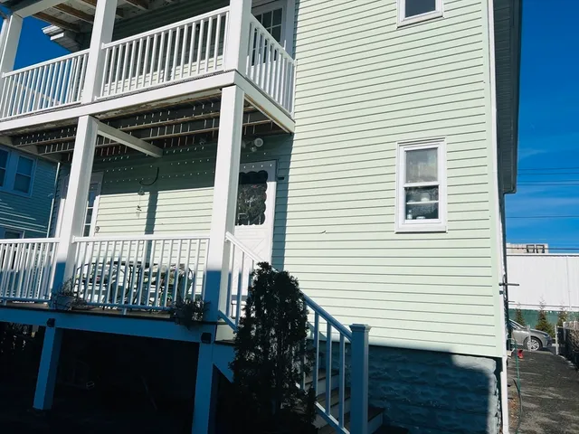 a view of a house with a deck