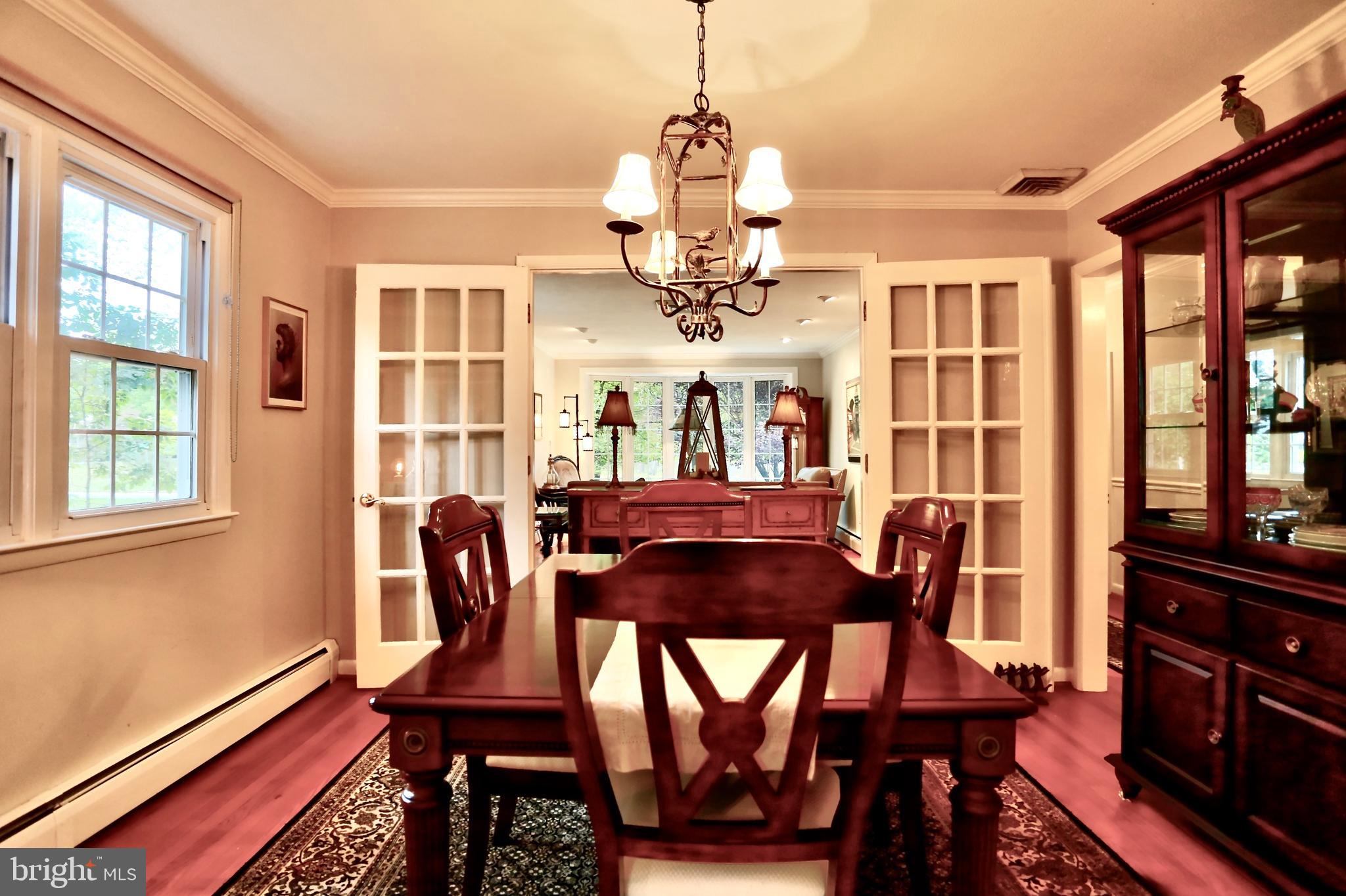 12 Cooper Run Drive Cherry Hill, NJ 08003 - Photo 11 of 50 a view of a dining room with furniture window and wooden floor