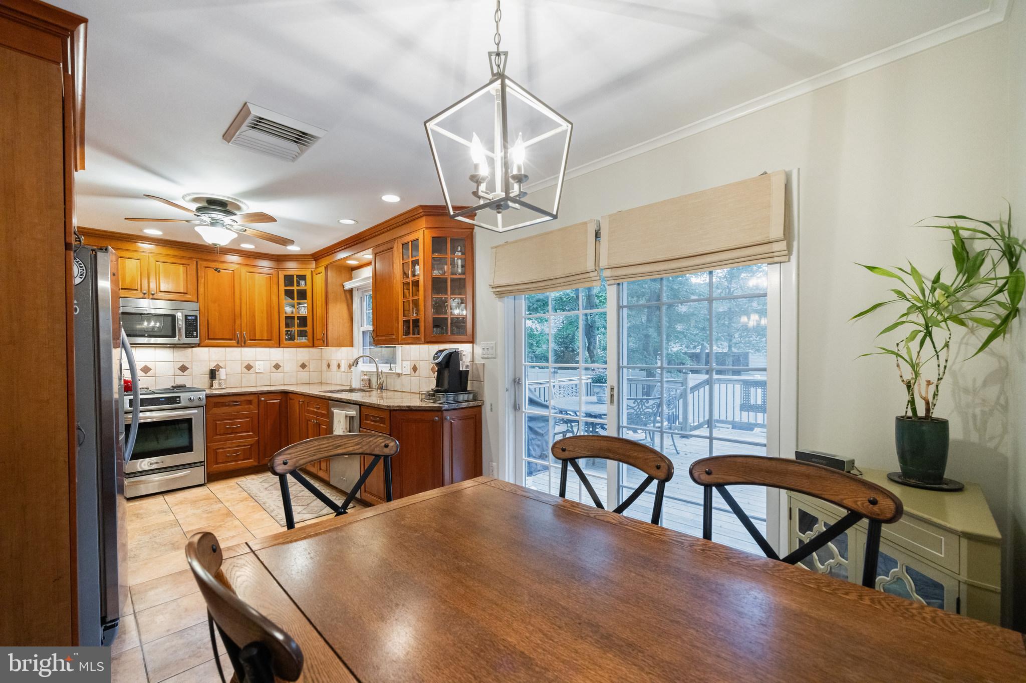 12 Cooper Run Drive Cherry Hill, NJ 08003 - Photo 16 of 50 a view of a dining room with furniture window and wooden floor