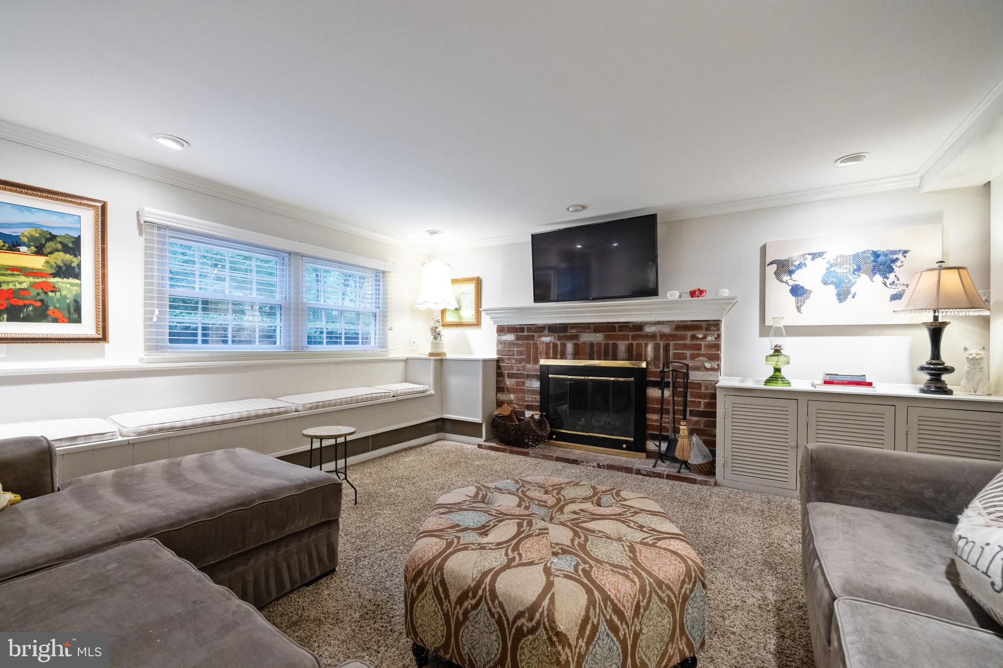 12 Cooper Run Drive Cherry Hill, NJ 08003 - Photo 17 of 50 a living room with furniture a fireplace and a flat screen tv