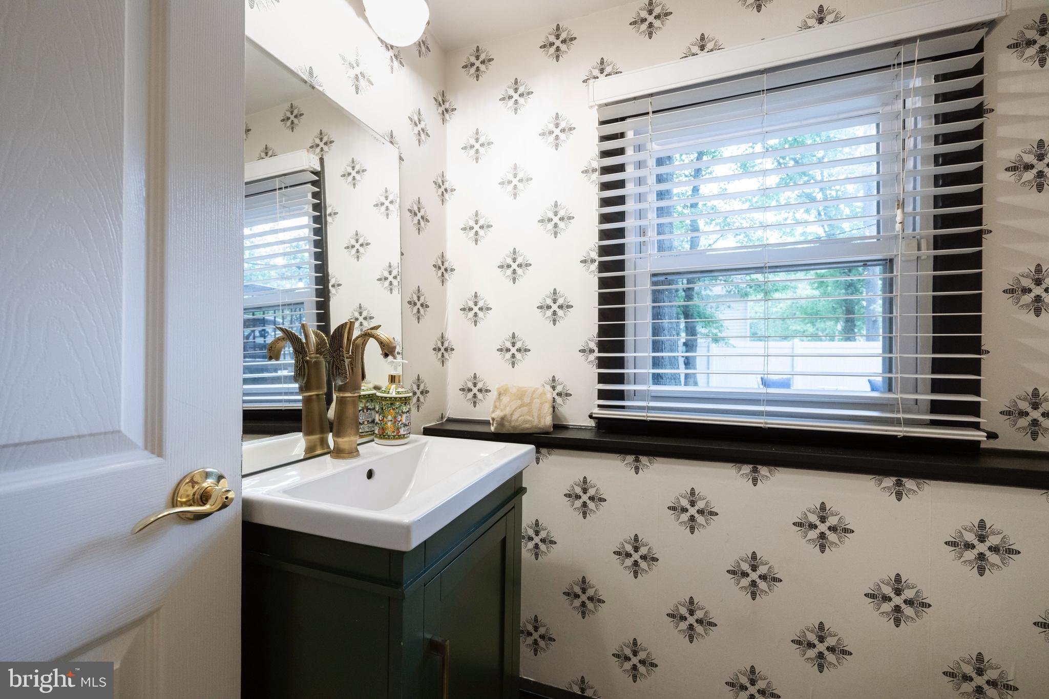 12 Cooper Run Drive Cherry Hill, NJ 08003 - Photo 23 of 50 a bathroom with a sink and a mirror