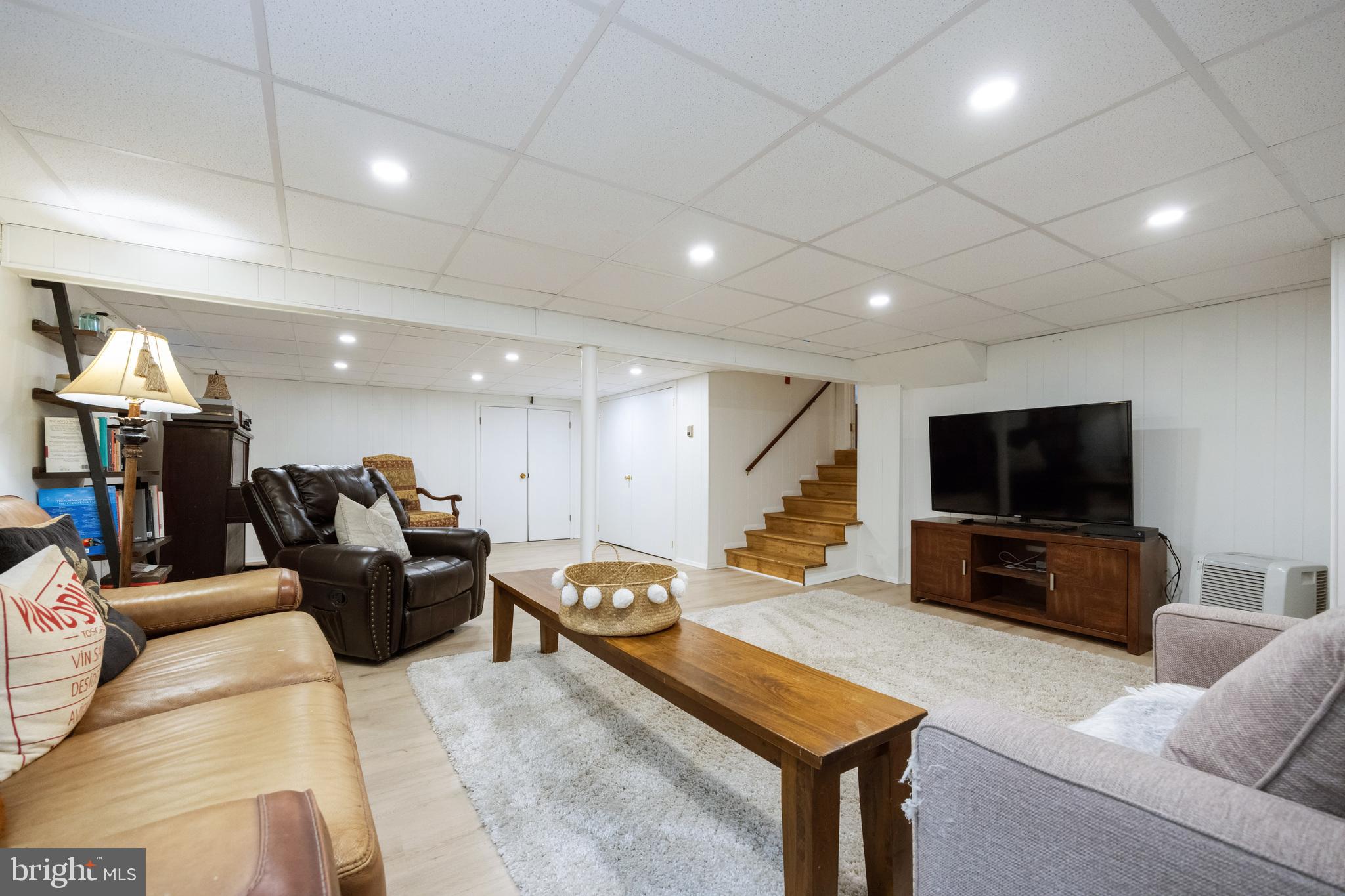 12 Cooper Run Drive Cherry Hill, NJ 08003 - Photo 26 of 50 a living room with furniture and a flat screen tv