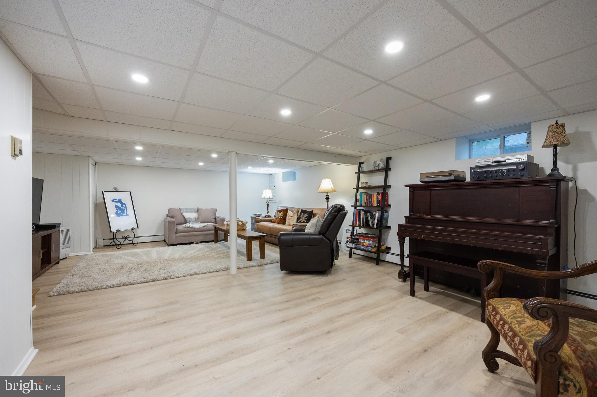 12 Cooper Run Drive Cherry Hill, NJ 08003 - Photo 27 of 50 a living room with furniture and a flat screen tv