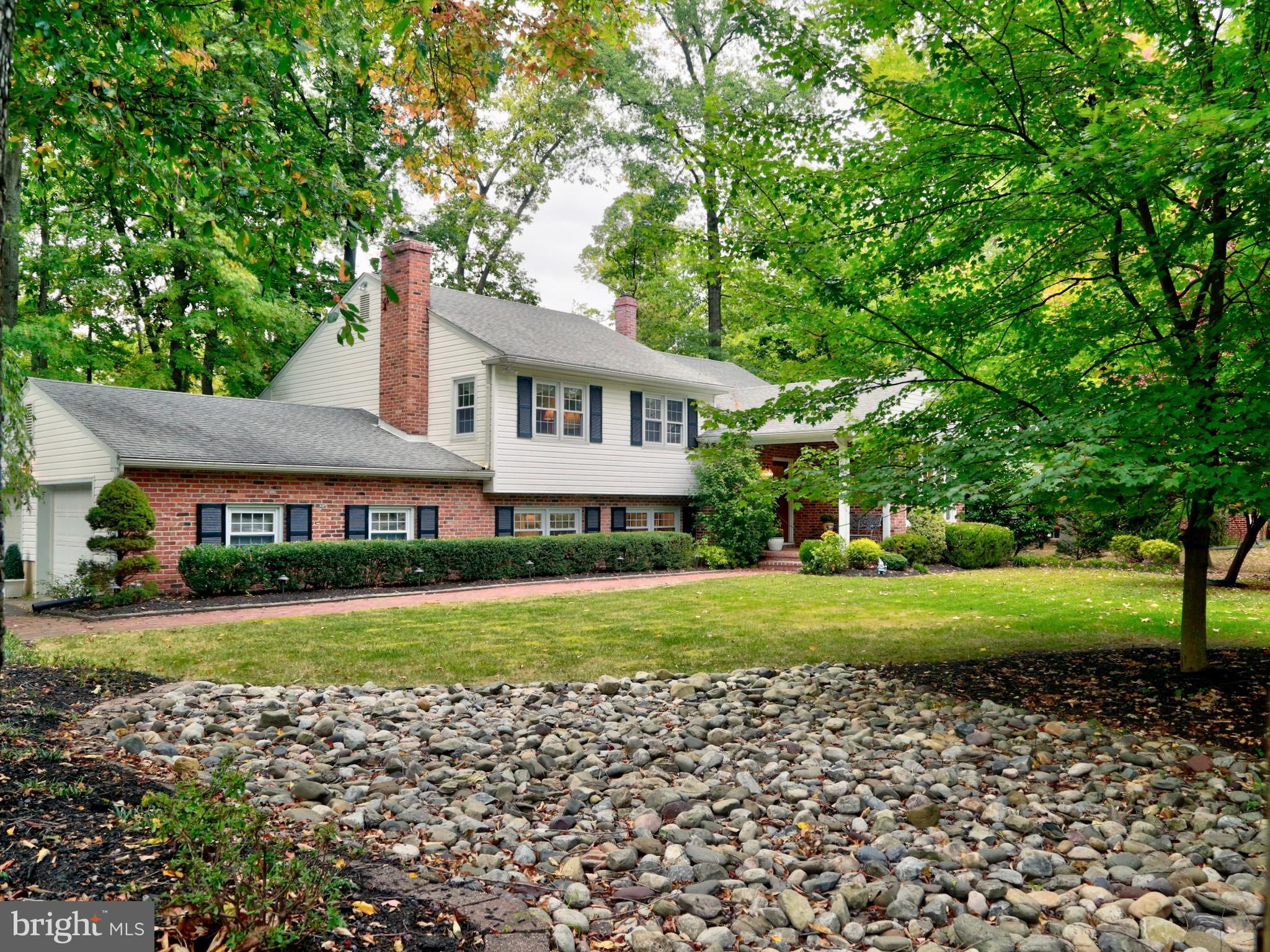 12 Cooper Run Drive Cherry Hill, NJ 08003 - Photo 3 of 50 a front view of a house with a yard