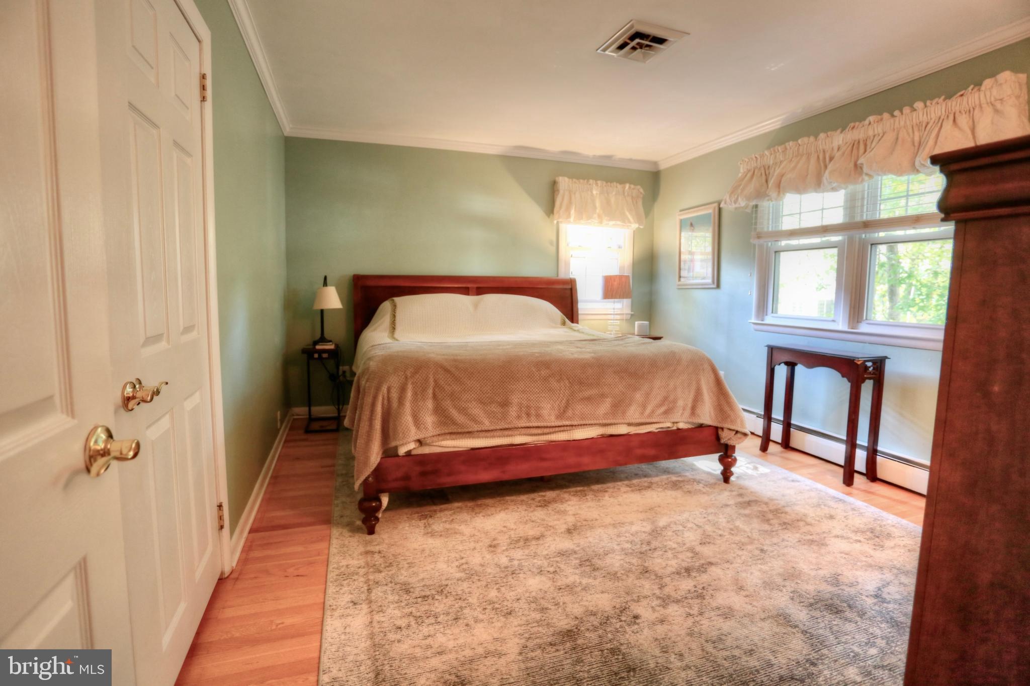 12 Cooper Run Drive Cherry Hill, NJ 08003 - Photo 34 of 50 a bedroom with a bed and a window