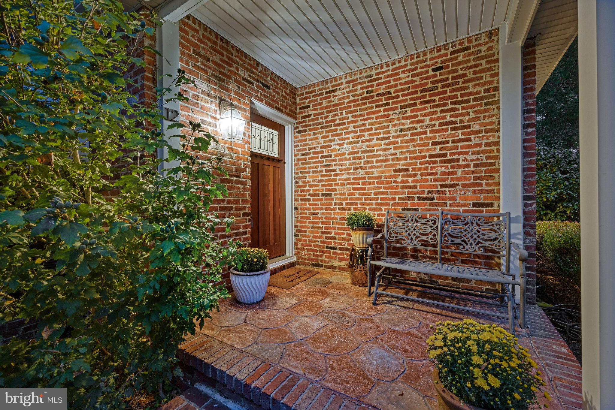12 Cooper Run Drive Cherry Hill, NJ 08003 - Photo 4 of 50 a view of a chairs and table in the back yard of the house