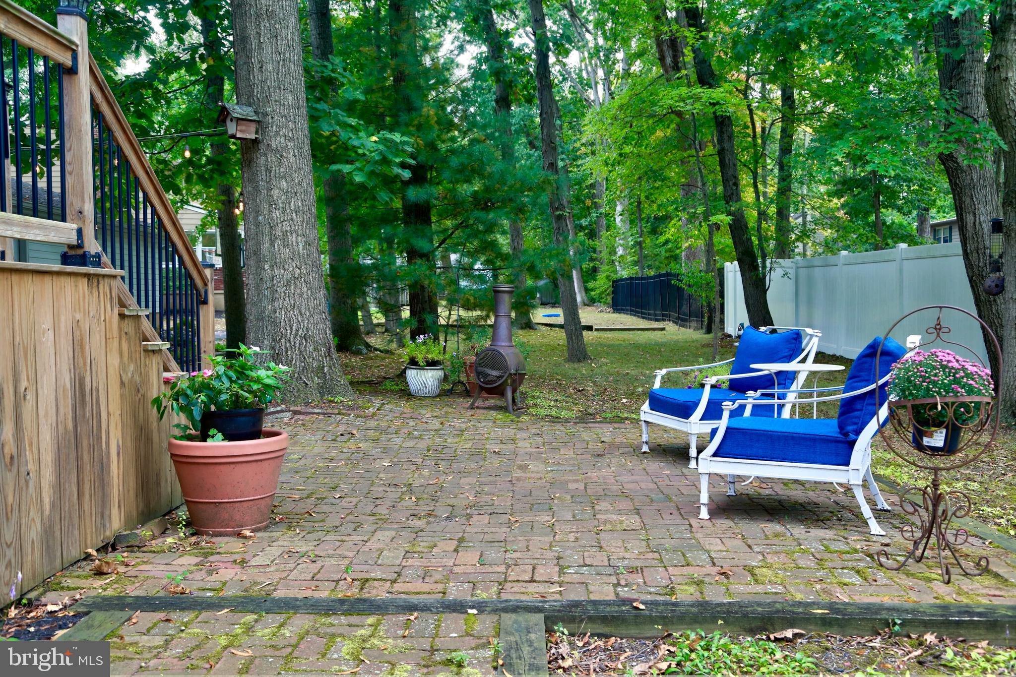 12 Cooper Run Drive Cherry Hill, NJ 08003 - Photo 47 of 50 a bench sitting in the middle of a yard