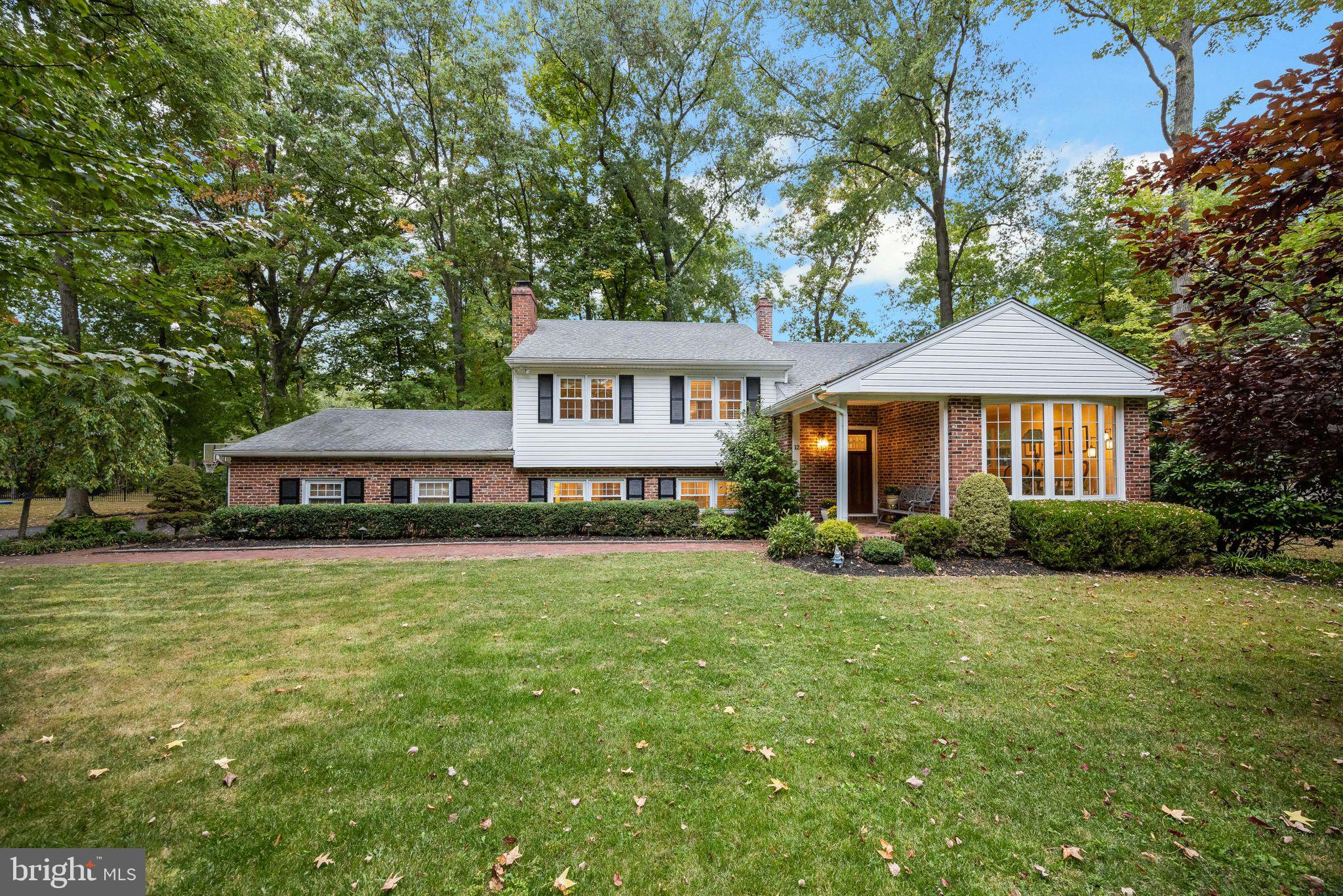 12 Cooper Run Drive Cherry Hill, NJ 08003 - Photo 48 of 50 a front view of a house with a garden