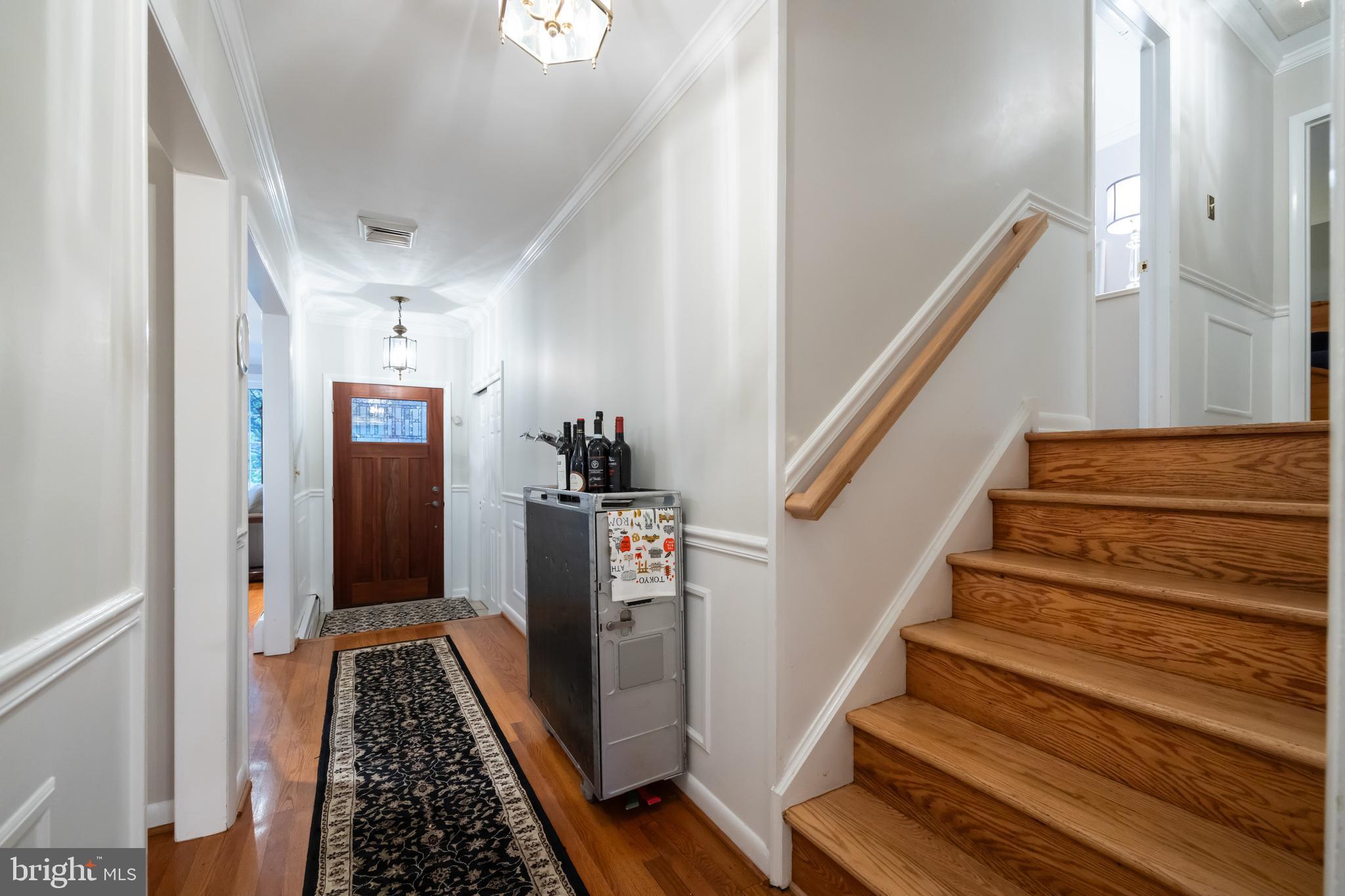 12 Cooper Run Drive Cherry Hill, NJ 08003 - Photo 5 of 50 a view of entryway and hall with wooden floor