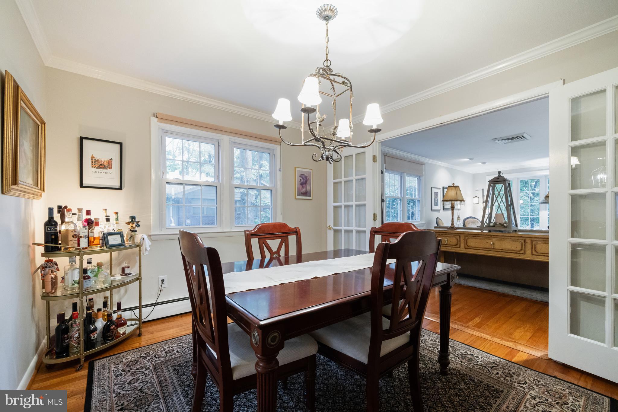 12 Cooper Run Drive Cherry Hill, NJ 08003 - Photo 10 of 50 a view of a dining room with furniture and a chandelier