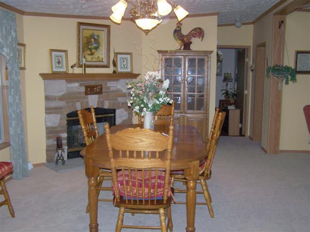 250 Day Lane Tennessee Ridge, TN 37178 - Photo 12 of 20 Greatroom being used as Dining Room w/Stone Propane Log Fireplace