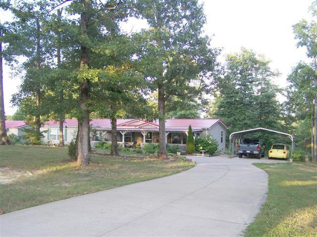 250 Day Lane Tennessee Ridge, TN 37178 - Photo 20 of 20 Concrete Driveway. Carport Awning.