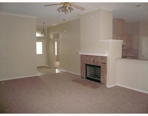 7809 Armstrong Drive Corpus Christi, TX 78413 - Photo 6 of 10 a view of a livingroom with a fireplace