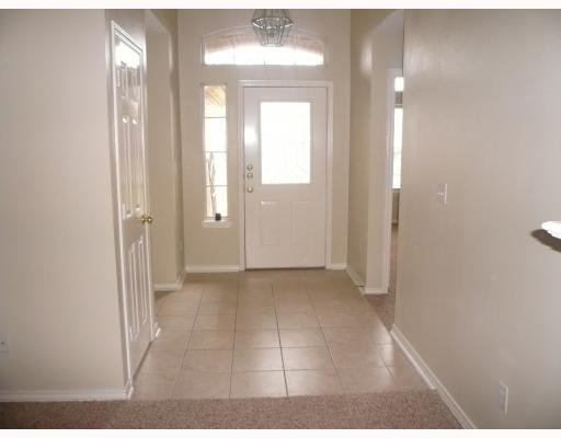 7809 Armstrong Drive Corpus Christi, TX 78413 - Photo 7 of 10 a view of a hallway with wooden floor