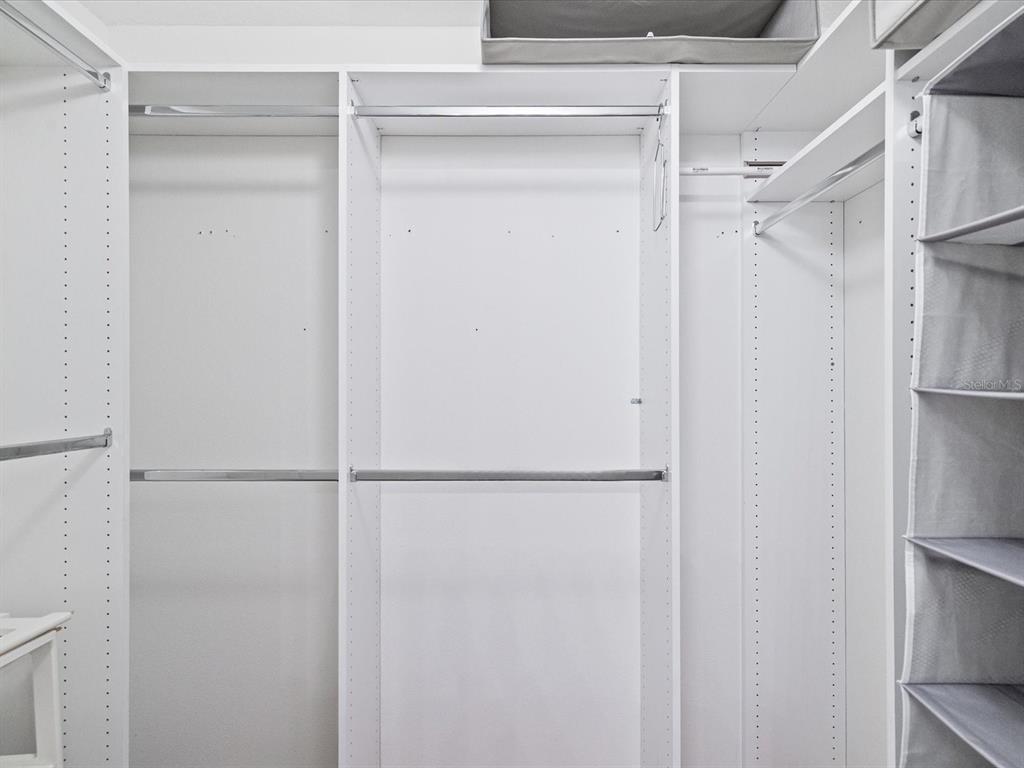 11217 Kangley Lane Spring Hill, FL 34608 - Photo 20 of 43 a bathroom with a glass shower door