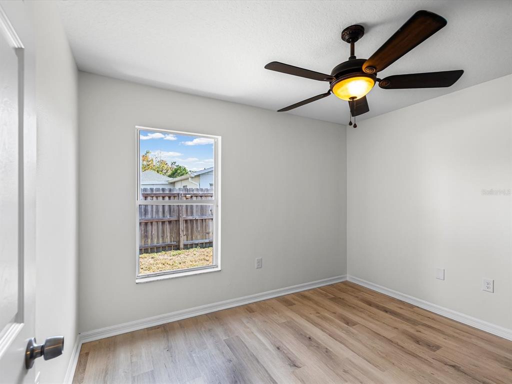 11217 Kangley Lane Spring Hill, FL 34608 - Photo 23 of 43 an empty room with a window