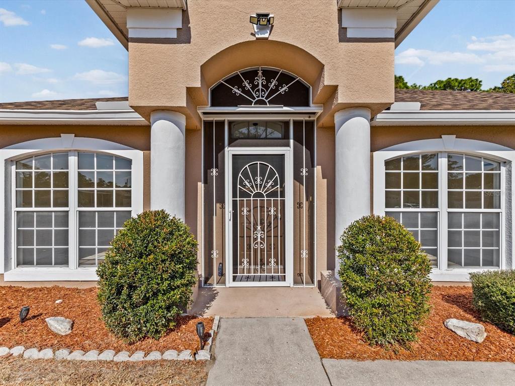 11217 Kangley Lane Spring Hill, FL 34608 - Photo 7 of 43 a front view of a house