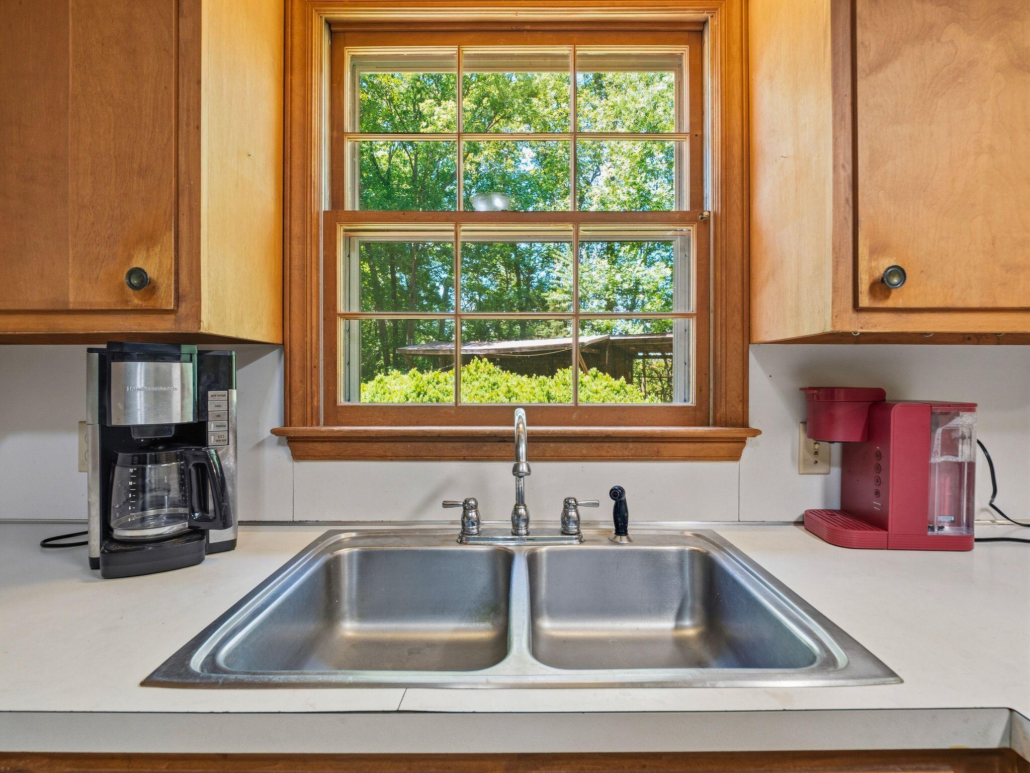 1115 Robin Ridge Road Henry, VA 24102 - Photo 11 of 54 a kitchen with a sink and a window