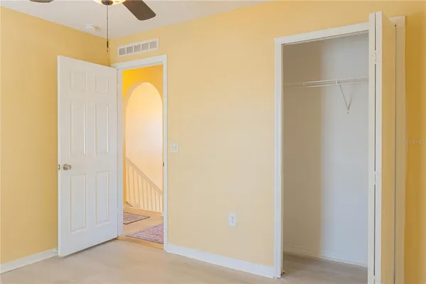 a bathroom with a shower and a mirror