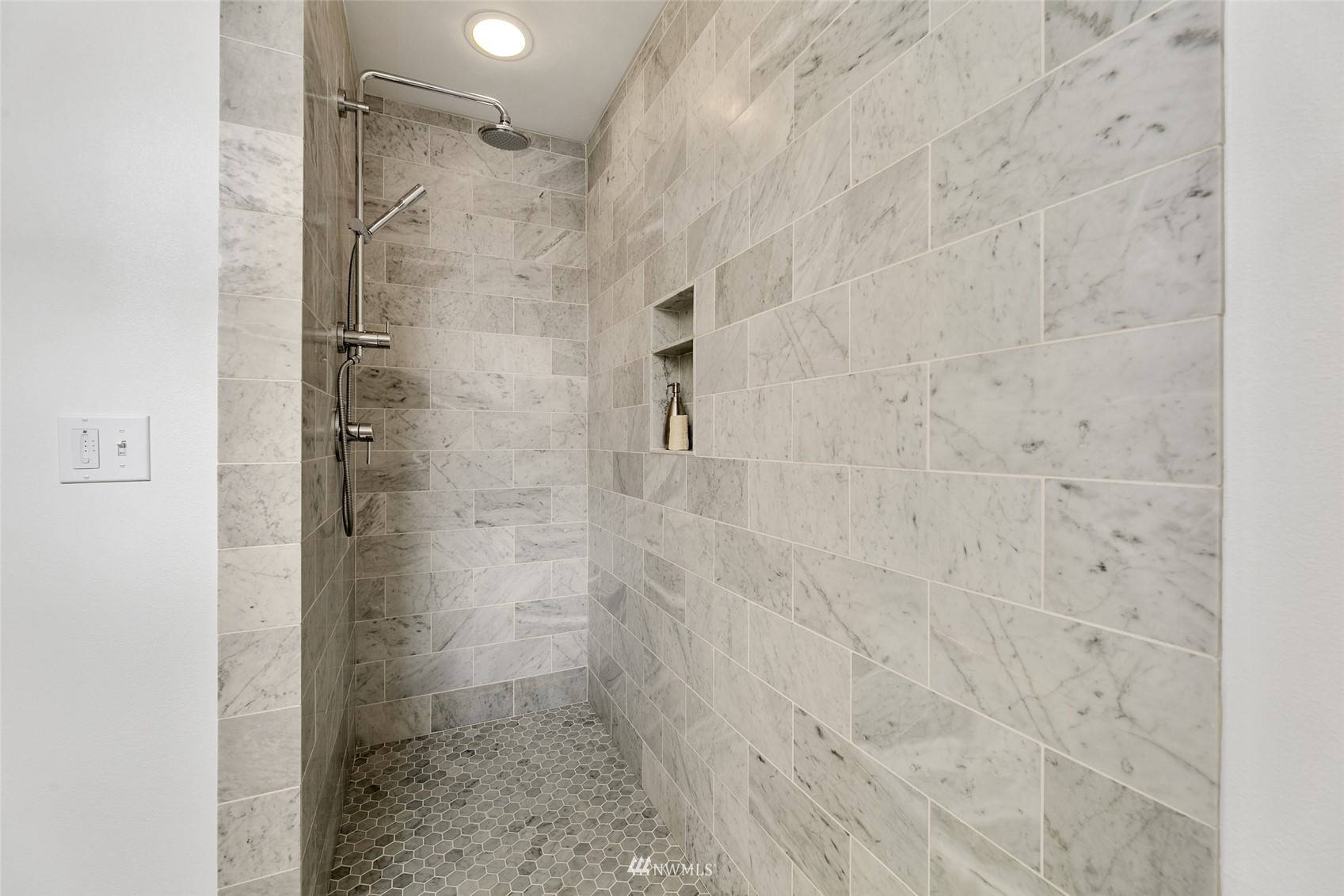 327 West Olympic Place, Unit F Seattle, WA 98119 - Photo 16 of 39 a bathroom with a shower