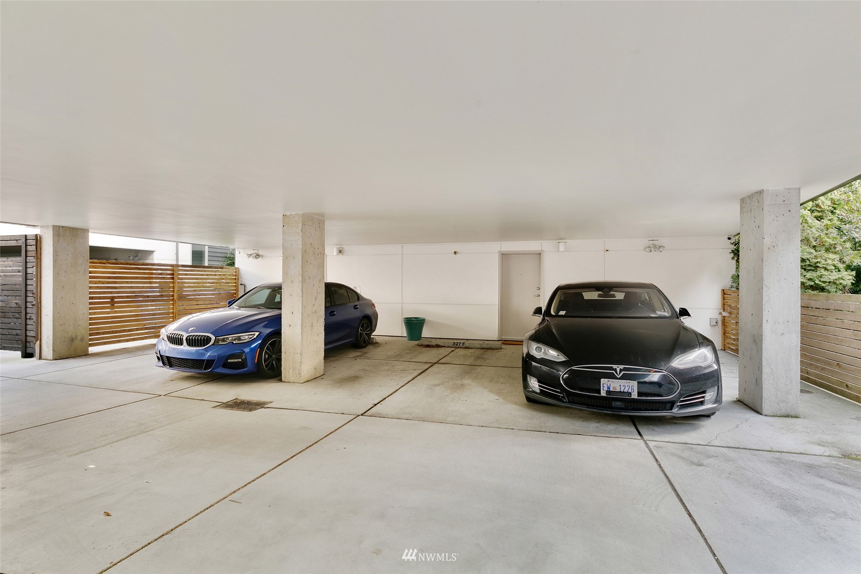327 West Olympic Place, Unit F Seattle, WA 98119 - Photo 23 of 39 a car parked in garage
