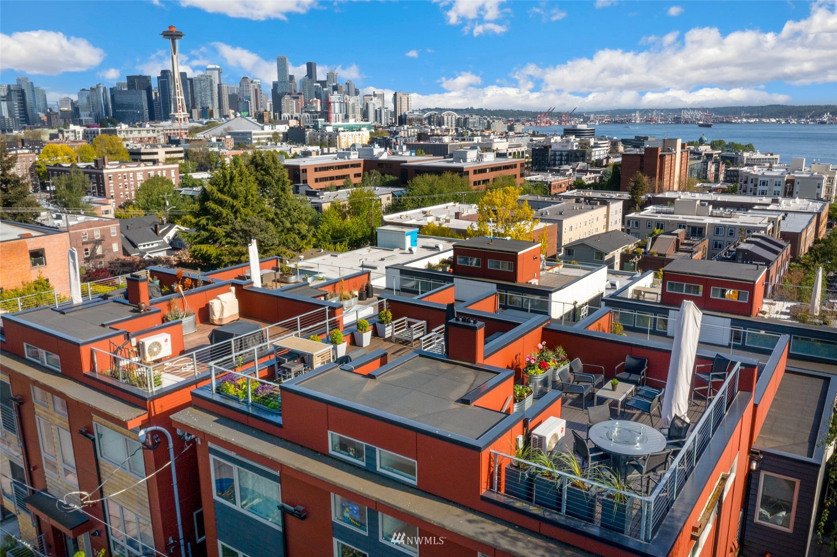 327 West Olympic Place, Unit F Seattle, WA 98119 - Photo 32 of 39 a view of a chairs and cars park on the roof