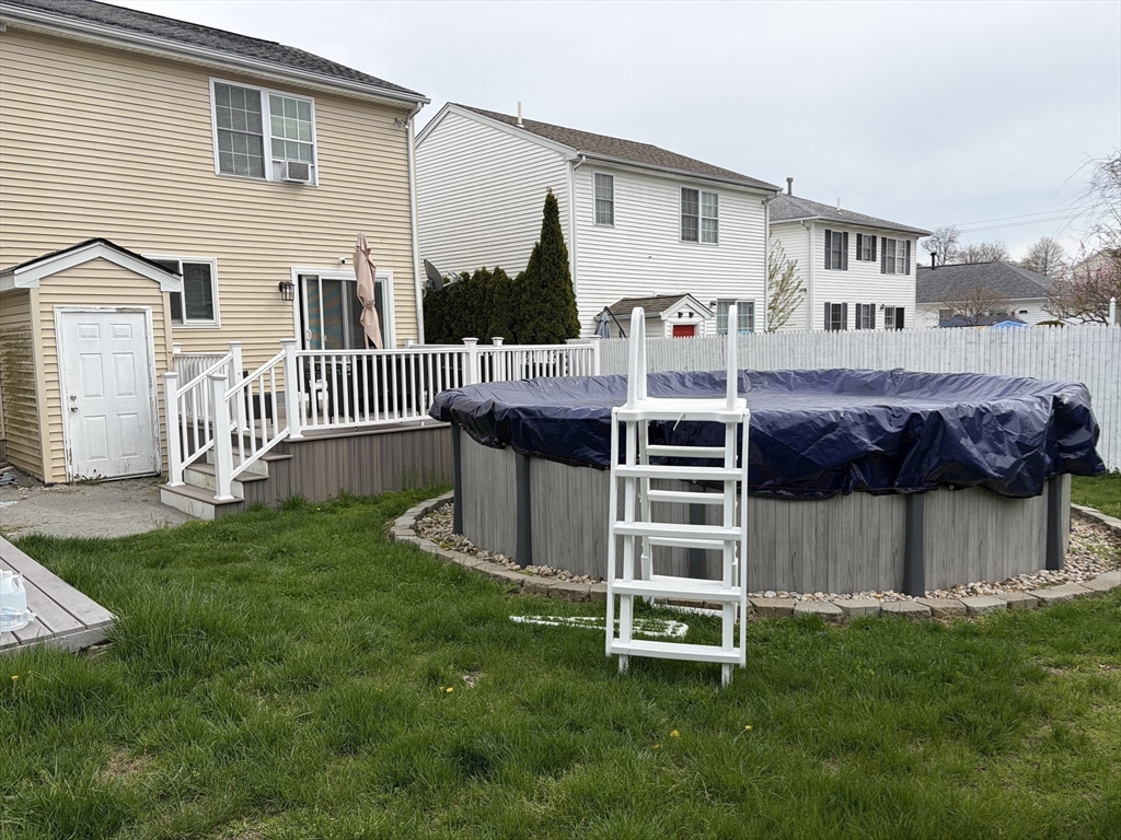 231 Lapham Street Fall River, MA 02721 - Photo 5 of 20 a front view of a house with a garden