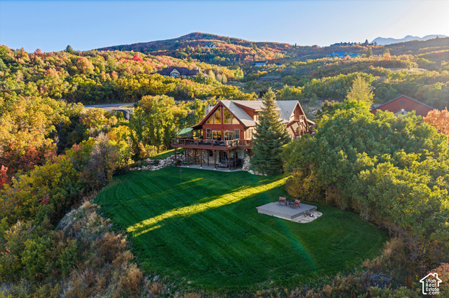 5878 Snowbasin Road Huntsville, UT 84317 - Photo 74 of 90 Expansive terraced property with a large, manicured lawn