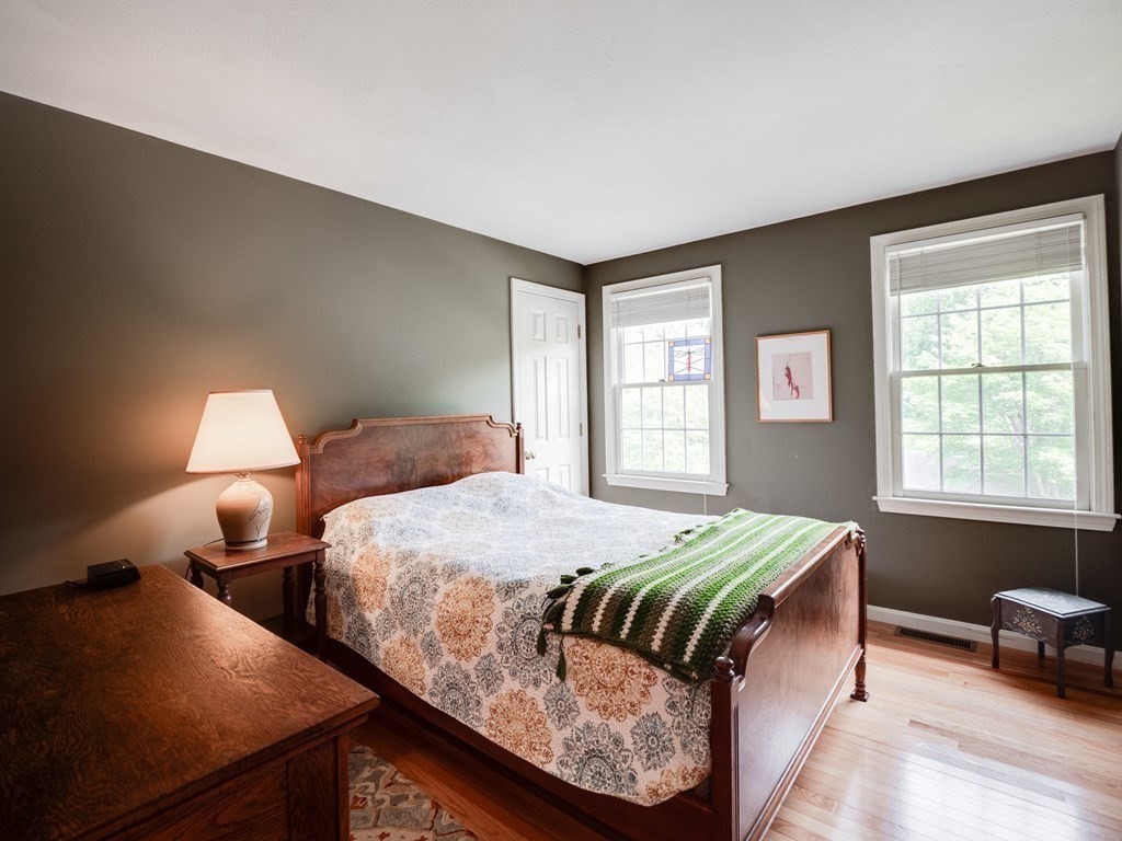 4 Crabtree Lane Shirley, MA 01464 - Photo 20 of 36 a bedroom with double bed and a window