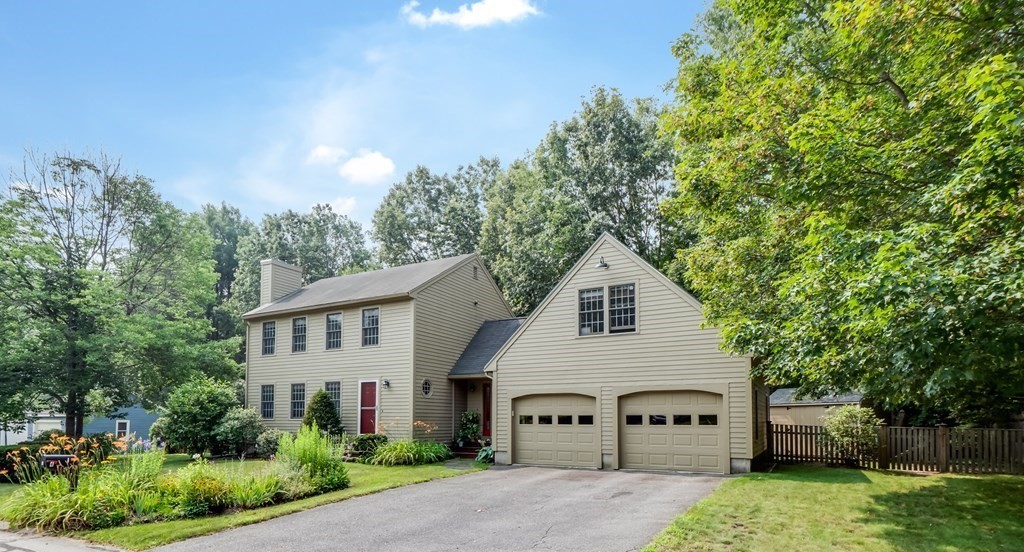 4 Crabtree Lane Shirley, MA 01464 - Photo 36 of 36 a view of a house with a yard and potted plants
