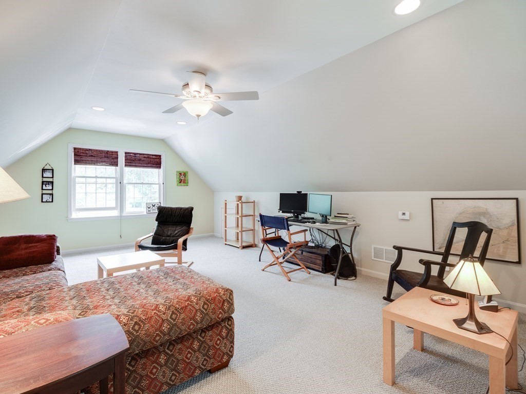 4 Crabtree Lane Shirley, MA 01464 - Photo 5 of 36 a living room with furniture and a flat screen tv