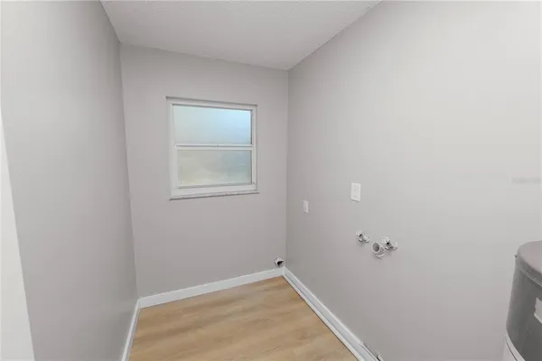 a view of an empty room with window