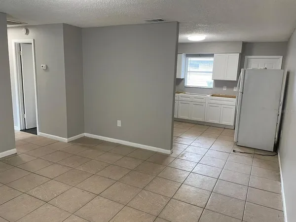 a bathroom with a toilet a sink and bathtub