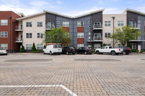 a cars parked in front of a building