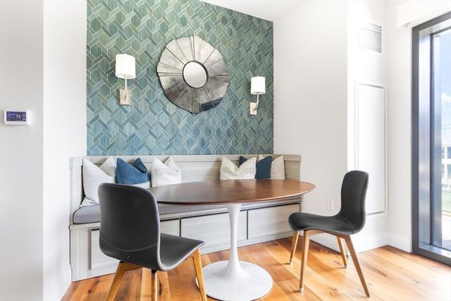 a workspace with furniture and wooden floor